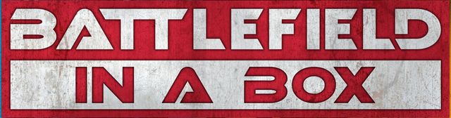A bold graphic features the text "BATTLEFIELD IN A BOX" prominently displayed in large, stylized letters. The background is a textured red, contrasting with the white and silver elements of the text. The overall design conveys a strong, dynamic feel, suitable for a tabletop gaming context.