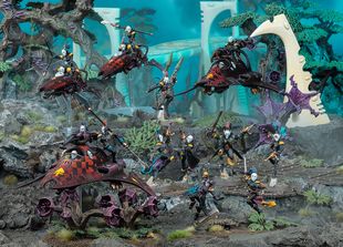 A dynamic scene showcases a group of Harlequin miniatures from Games Workshop, featuring vibrant colors and intricate details. The display includes two Skyweavers and a Starweaver, with Harlequin models in various poses, some wielding weapons and others in dramatic stances. The background features a fantastical landscape with alien flora, enhancing the colorful and theatrical theme of the Harlequins.