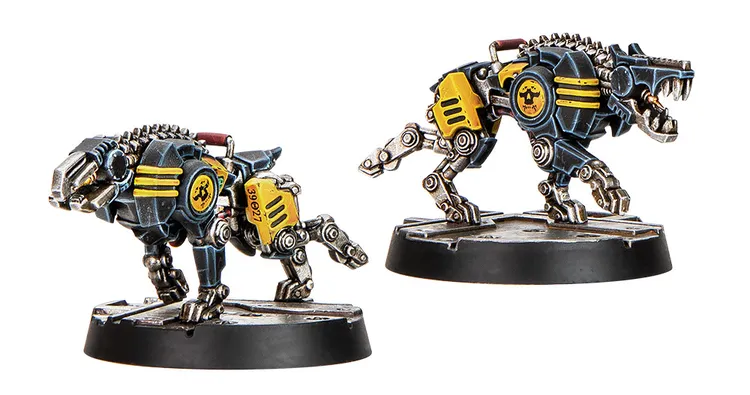 Two robotic canines, known as Hardcase Cyber-Mastiffs, are depicted in the image. They feature a sleek, metallic design with a dark blue body, accented by yellow details and mechanical joints. Each dog stands on a circular base, showcasing their imposing presence, with one positioned in a more dynamic stance while the other appears slightly more stationary.