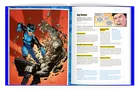 Open book showing comic art on left page and "Key Themes" text on right page.