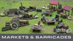 A detailed tabletop scene features a variety of marketplace elements, including wooden stalls, barrels, crates, and bags, all set on a grassy surface. The scene showcases multiple tables with assorted food items and decorative pieces, emphasizing the bustling atmosphere of a market. Above the scene, the text "GENERAL ACCOUTREMENTS" and "MARKETS & BARRICADES" is prominently displayed, indicating the theme of the set.