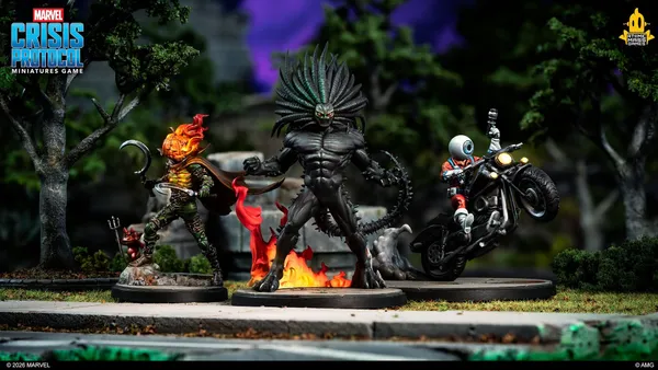Two miniature figures on bases: one with a skeletal, armored design, glowing red flames on head and chest, holding a hammer, standing on a rocky surface; another with a muscular, black-skinned figure with a spiked helmet, flexing arms, surrounded by fire.