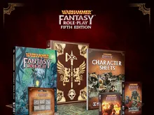 Warhammer Fantasy Role-Play Fifth Edition books, dice, and maps on dark background.
