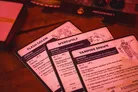 Werewolf, Vampire Spawn, and Golem cards on a wooden table.