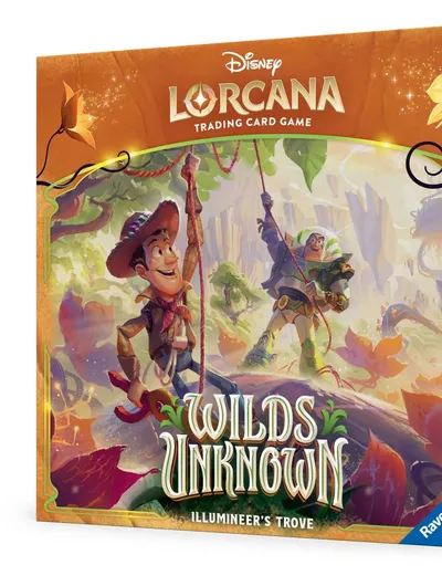 A colorful box for the Disney Lorcana Trading Card Game expansion titled "Wilds Unknown," featuring characters from Toy Story, Buzz Lightyear and Woody, depicted in a vibrant, adventurous landscape filled with lush greenery and fantastical elements. The title "WILDS UNKNOWN" is prominently displayed at the center, with the subtitle "ILLUMINEER'S TROVE" below it. The box design includes whimsical details and a logo for Ravensburger, enhancing the adventurous theme of the set.