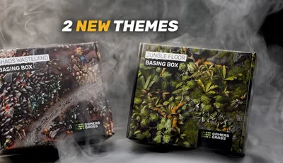 Two boxes labeled "JUNGLE FLOOR BASING BOX" and "CHAOS WASTELAND BASING BOX" with smoke.