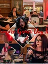A collage of images from Vampire Games Day II showcases various participants engaged in tabletop roleplaying games in a gothic setting. In the top left, a group of players sits around a table, with a portrait hanging on the wall behind them. The center features a participant with cat-like ears extending a hand, while the bottom left shows a storyteller in a red vest leading a session. The bottom right highlights a player in a black lace outfit, all set against a backdrop of elegant wooden decor and ambient lighting. The title "Vampire Games Day II" is prominently displayed in a bold, red font across the collage.