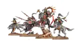 A dynamic display of goblin miniatures features several wolf-riding characters, including a prominent leader adorned with armor and a shield, riding a large, fierce wolf. The scene includes additional goblins on smaller wolves, all equipped with weapons and armor, set against a rocky base with tufts of grass. The miniatures showcase intricate details and vibrant colors, emphasizing their fierce and whimsical nature.