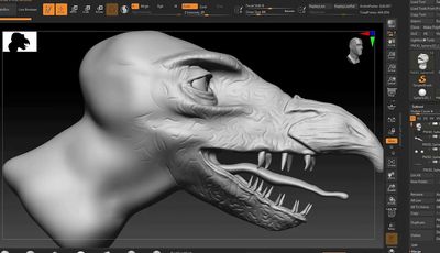 A close-up view of a digital sculpting project in ZBrush, showcasing a stylized dinosaur head. The model is primarily in a gray, untextured state, highlighting the intricate details of the scales and facial features, including a prominent eye and sharp teeth. The interface of ZBrush is visible at the top, displaying various sculpting tools and settings.
