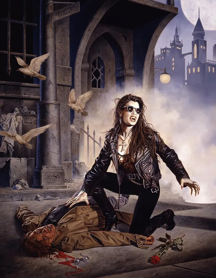 A woman with long, dark hair and sunglasses stands dramatically over a fallen man in a leather jacket, set against a moody urban backdrop. The scene features a misty street with a street sign reading 