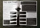 Open book with text and illustration of a tall tower labeled "THE SANCTUARY".