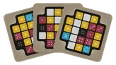 Three game cards are displayed, each featuring a grid layout filled with various colored shapes. The shapes include yellow diamonds, blue circles, red squares, and black crosses, arranged on a background of alternating black and white squares. The cards have ornate borders, suggesting a fantasy theme, likely reflecting the Critical Role universe.