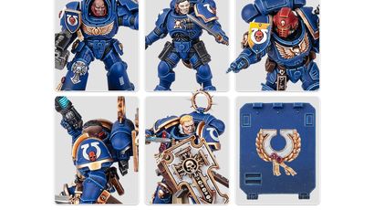 A collection of Ultramarine miniatures showcases various Space Marine figures in blue armor, each featuring distinct details and accessories. The top row includes a character with a prominent helmet and ornate chest emblem, alongside two other figures with different poses and weaponry. The bottom row features a close-up of a figure holding a weapon, another with a skull motif on the armor, and a character wielding a large, intricately designed shield. Additionally, a transfer sheet with various decals is visible, featuring Ultramarine symbols and decorative borders.