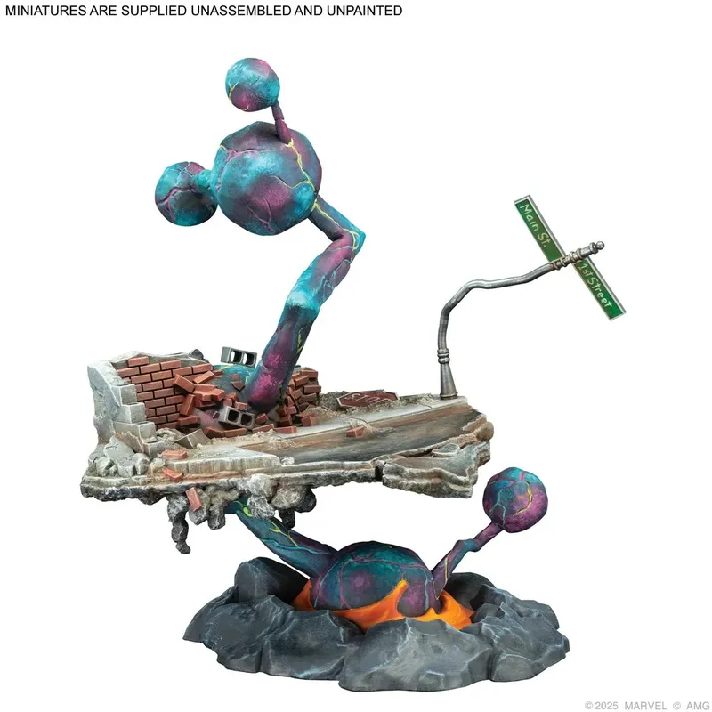 A painted miniature of a large, colorful, humanoid figure with a rounded head and body, standing on a ruined brick wall base. The figure has a long, thin arm extending upward, holding a green street sign labeled "Main St" and "75th Street". The base includes broken bricks and debris. The background is plain white. Text at the top reads "MINIATURES ARE SUPPLIED UNASSEMBLED AND UNPAINTED". In the bottom right corner, text reads "©2025 MARVEL © AMG".