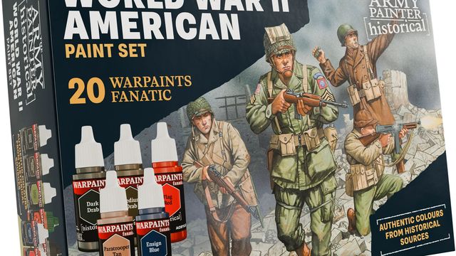 A paint set titled "World War II American Paint Set" features a box design showcasing three American soldiers in historical uniforms, set against a backdrop of crumbling walls. The box includes five paint bottles prominently labeled "WARPAINTS FANATIC," with colors such as "Dark Drab," "Medium Drab," "Paratrooper Tan," "Tang Red," and "Ensign Blue." The text emphasizes "20 WARPAINTS FANATIC" and "AUTHENTIC COLOURS FROM HISTORICAL SOURCES," highlighting the set's focus on historical accuracy.