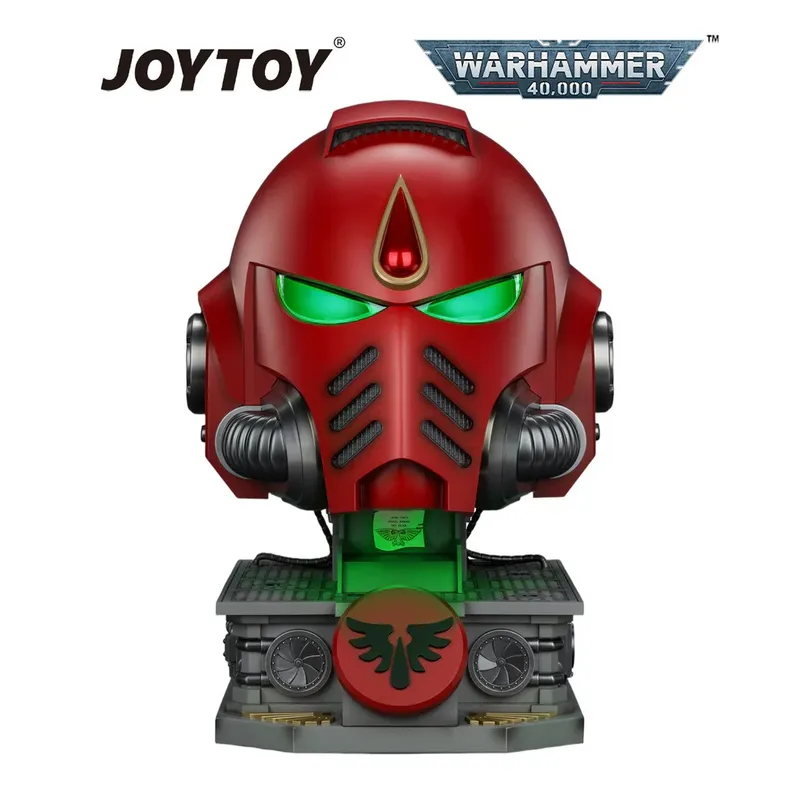 Red Space Marine helmet with glowing green eyes on a stand, "JOYTOY WARHAMMER 40,000" text.