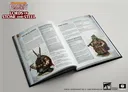An open book titled "Lords of Stone and Steel" displays two character profiles: King Brock Ironpick and Queen Thurma. King Brock, depicted in armor with a horned helmet, is illustrated on the left, while Queen Thurma, wearing a fur-lined cloak and holding a staff, is shown on the right. The pages feature text detailing their backgrounds and attributes, set against a muted, icy backdrop that complements the Dwarven theme.