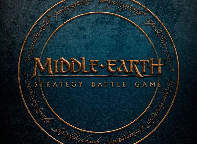 The image features the title "MIDDLE-EARTH STRATEGY BATTLE GAME" prominently displayed in a bold, stylized font, set against a textured dark blue background. Surrounding the title is a circular design that includes intricate, golden script, reminiscent of Tolkien's lore. The overall aesthetic conveys a sense of adventure and fantasy, aligning with the themes of the game.