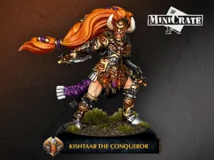 Kishtaar the Conqueror is depicted as a fierce warrior in ornate brass-faced armor adorned with intricate details and horned accents. She has long, flowing orange hair and stands confidently on a textured base with patches of grass. The figure is posed dynamically, holding a weapon in one hand, emphasizing her role as a powerful leader in the Warmachine universe. The name "KISHTAAR THE CONQUEROR" is displayed prominently at the bottom of the image.