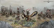 Miniature battle scene featuring a large, ornate eagle-like creature with outstretched wings, central. Surrounding it are six armored Stormcast Eternals in dynamic poses, some holding weapons. Background includes ruins, mist, and distant structures. No legible text.