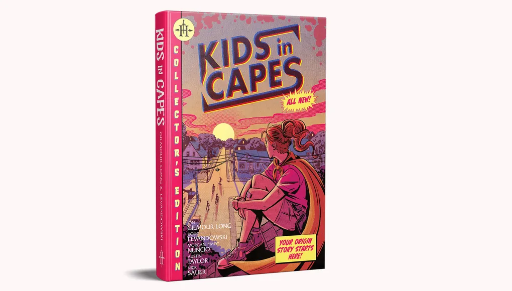 A vibrant book cover for "Kids in Capes" features a young girl with a ponytail, wearing a red cape and a pink shirt, sitting on a sidewalk. The background depicts a suburban neighborhood with houses and trees under a sunset sky. The title "KIDS in CAPES" is prominently displayed in bold, colorful letters, along with the text "COLLECTOR'S EDITION" and "YOUR ORIGIN STORY STARTS HERE!" in bright yellow.
