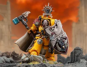 A dynamic miniature of Darnath Lysander in bright yellow Terminator armour, holding the relic storm shield Rampart in one hand and the Fist of Dorn power hammer in the other. His expression is fierce, and he wears a flowing cape, with intricate details on his armour and shield, including the name "LYSANDER" and various symbols. The background features a dramatic, fiery sky, enhancing the imposing presence of the character.