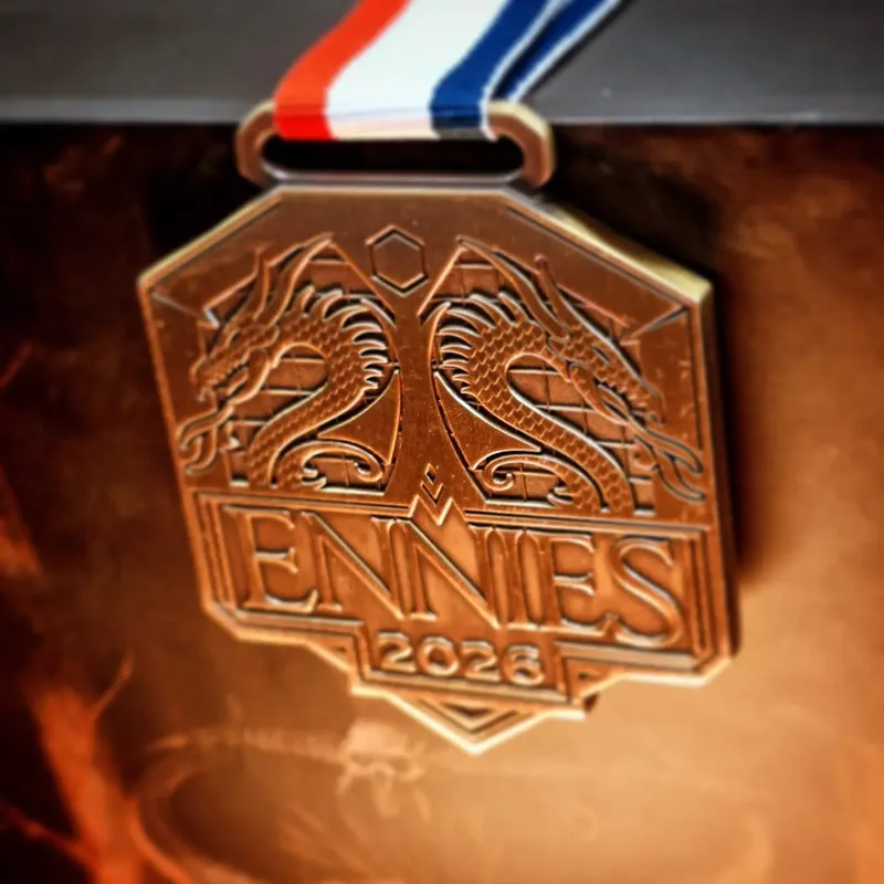 Bronze ENNIES 2026 medal with red, white, blue ribbon