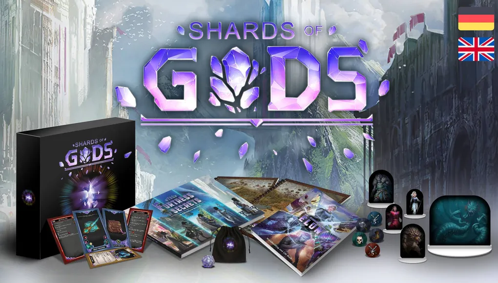 A black box labeled "SHARDS OF GODS" is prominently displayed in the foreground, surrounded by various game components including pre-generated character cards, tokens, and a unique D20 die. In the background, several books are visible, including an adventure book titled "The Fortress of Secrets," alongside battle maps. The scene is set against a mystical backdrop featuring ethereal elements and shards, enhancing the fantasy theme of the game.