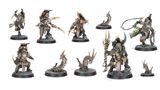 A collection of six intricately designed miniatures representing the Sha’dar Hunters from Necromunda, accompanied by their Arthromite spinewyrms. The hunters are clad in rugged, post-apocalyptic armor, featuring various weapons and gear, while the spinewyrms exhibit a segmented, menacing appearance. The bases of the miniatures are textured to resemble the harsh terrain of the Ash Wastes, enhancing the overall theme of survival in a desolate environment.