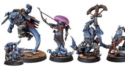 A collection of miniatures from the Voidsea campaign features a variety of fantastical characters. On the left, a large, muscular humanoid figure with blue skin and a rugged outfit stands in a dynamic pose. Next to it, a slender, dark-skinned character with a jellyfish-like head holds a weapon, adorned in tattered clothing. To the right, a small, blue creature with a mischievous expression stands on a wooden base, while another figure with a claw and a menacing stance completes the lineup. The miniatures are intricately detailed, showcasing a mix of pirate and eldritch themes.