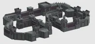 A detailed 3D model of a modular fortress designed for sci-fi tabletop gaming, featuring a complex layout of walls, towers, and bunkers. The fortress includes various architectural elements such as removable rooftops, walkways, and battle-damaged sections, all rendered in a dark color scheme. The structure is designed for customizable setups, making it suitable for strategic gameplay scenarios like sieges and defenses.