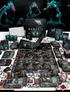 Board game box and components for Nemesis, featuring a large modular map with hexagonal tiles, various miniatures of grotesque enemies, character cards, and small tokens. Central box displays "NEMESIS" on a dark sci-fi horror-themed cover. Rulebooks, dice, and accessory boxes are scattered around.