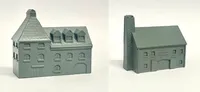 A detailed model of a building designed for 6mm scale wargames, featuring a sloped roof with three dormer windows and a textured surface that resembles slate. The facade includes several arched and rectangular windows, along with a large door at the base, all rendered in a light gray resin. The overall design suggests an industrial style, suitable for various historical or modern warfare settings.