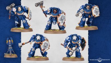 Five Space Marine Assault Terminators are displayed, each wearing iconic blue power armor and equipped with various weapons, including thunder hammers and storm shields. The miniatures feature detailed designs, with some having unique head options and tilting plates adorned with purity seals and badges. The background is a subtle gradient, enhancing the focus on the intricately crafted models.