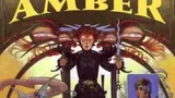 A vibrant illustration features a central figure, a woman with striking red hair, holding two swords and dressed in dark attire, symbolizing strength and authority. Surrounding her are various fantastical elements, including creatures and scenes that hint at adventure, with smaller images of characters in the background. The title "AMBER" is prominently displayed at the top in bold letters, emphasizing the focus on the Amber Diceless Roleplaying Game.