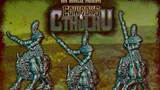 Humanoid aliens with spears riding horned, alien horses