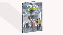 A roleplaying game sourcebook titled "Star Trek Adventures" features a colorful cover with a futuristic starship and various characters in a sci-fi setting. The characters, including humanoids of different species, are depicted in a range of outfits, suggesting a diverse crew. The title and subtitle are prominently displayed at the top and bottom, with the publisher's logo visible on the spine.