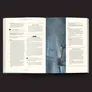 An open book displays a page from "Coriolis: The Great Dark," featuring a detailed layout of a chapter with text and illustrations. The left page contains sections titled "The Platform," "The Emergency Broadcast," and "Central Spire Core," with descriptions and event prompts for gameplay. The right page features a striking illustration of a futuristic, icy environment with figures navigating a complex structure, surrounded by floating debris and a dark, atmospheric backdrop.