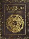 Gold circular Celtic knot design on dark leather-textured background with ornate borders. Text: "Ars Magica Definitive Edition".