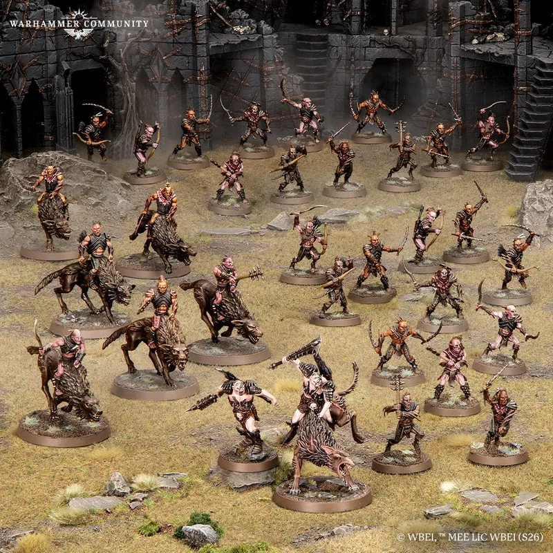 Miniature figures of armed warriors, some on horseback, in a rocky terrain setting.