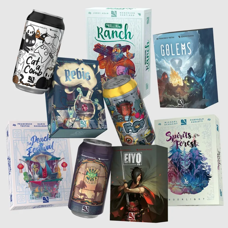 Three cylindrical metal tins and eight board game boxes arranged in a loose cluster against a white background. From top left, moving clockwise:

- A black tin labeled “Catacomb” with white skull-and-bones artwork.
- A white-and-green box titled “Rolling Ranch” showing cartoon animals and a farmer.
- A tall blue box titled “Golems” depicting fantasy creatures in a snowy landscape.
- A white box with “Spirits of the Forest – Moonlight” showing a stylized forest scene.
- A dark box titled “Eiyo” featuring a warrior with a sword.
- A purple tin labeled “Necro Safari” with a cartoon safari vehicle and fantasy creatures.
- A dark blue box for “The Peach Festival” with an Asian-inspired festival illustration.
- A small blue box titled “Rebis” showing alchemical symbols and a skull.
- A yellow-topped tin with “Hop!” and cartoon rabbits in a garden.
- A black-and-gold tin labeled “XOXO Sapiens” with a stained-glass-style illustration of a couple.