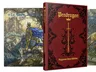 A rich red-and-gold leatherette book titled "Pendragon: Magnum Opus Edition" features ornate designs and a central sword motif, indicating its status as a special collector's edition. Next to it, "Pendragon: The Arthurian Companion - Special Edition" showcases a whimsical illustration of a creature with a leopard-like body and a long, serpentine tail, set against a forest backdrop. The titles are prominently displayed, highlighting their connection to the Pendragon roleplaying game and Arthurian lore.