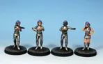 Four painted sci-fi miniatures in silver suits, purple hair, on black bases against a blue background.
