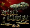A collection of miniature figures representing China's People's Liberation Army (PLA) is displayed against a backdrop of the Chinese flag. The set includes various contemporary infantry soldiers in camouflage uniforms, special operations troops, and unmanned ground vehicles (UGVs). A prominently featured armored vehicle is also present, alongside soldiers in different poses, some standing with weapons, others in prone positions, and two quadruped UGVs positioned on the ground.