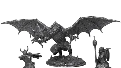 Gray metal miniatures: dragon, warrior, mage, thief on bases.