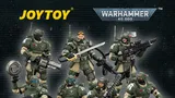 Seven green-armored action figures with weapons, "JOYTOY", "WARHAMMER 40,000", "ASTRA MILITARUM KASRKIN", "STAND WITH CADIA! - PRE ORDER NOW"