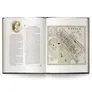 Open book showing a sepia-toned map of Upsala with labeled streets and landmarks. Left page features a portrait of a woman with text titled "Traces of the True" and dense paragraph of small print. Right page header reads "Evens of Upsala." No visible action or people.