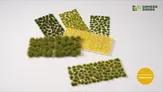 Green grass tufts on white and yellow sheets.