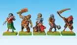 Five intricately designed miniatures are displayed against a light blue background, showcasing a variety of undead characters. From left to right, there is a skeletal figure with a clawed hand, a zombie wielding a large cleaver, a ghostly figure in tattered robes, a blue-skinned undead with a weapon, and a pirate-themed skeleton brandishing a scythe. Each figure stands on a green base adorned with tufts of grass, highlighting their dynamic poses and old-school aesthetic.