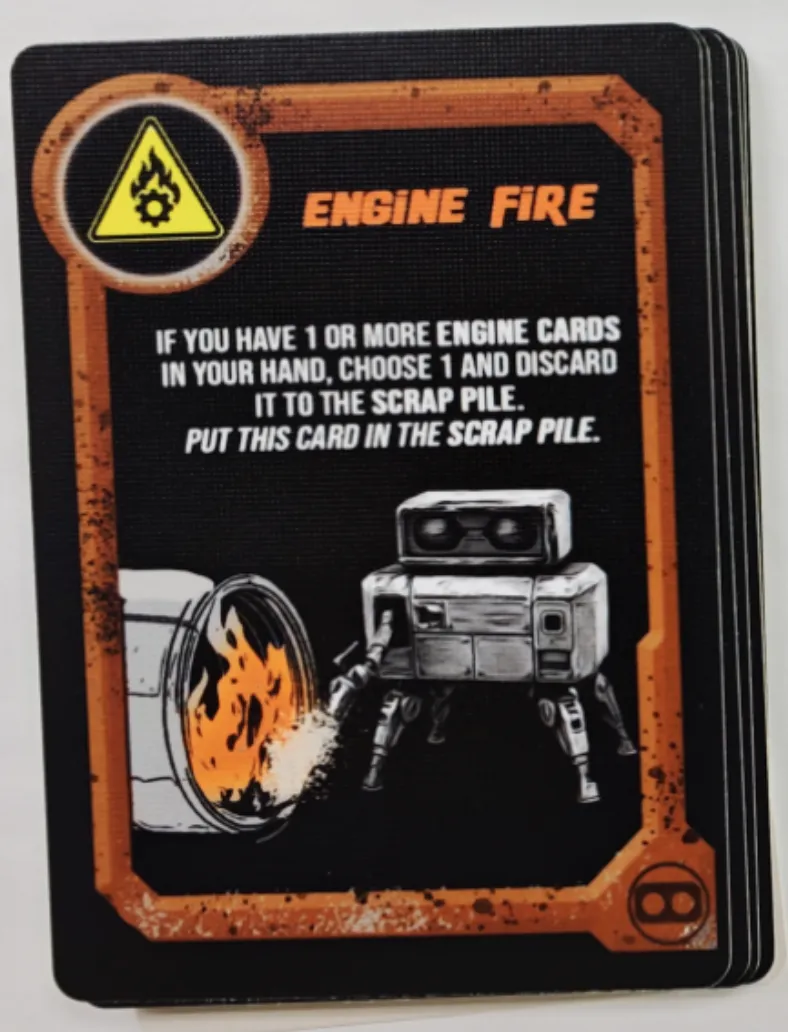 Robot discarding a flaming engine part into a barrel. Text: "IF YOU HAVE 1 OR MORE ENGINE CARDS IN YOUR HAND, CHOOSE 1 AND DISCARD IT TO THE SCRAP PILE. PUT THIS CARD IN THE SCRAP PILE."